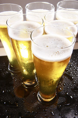 Cold beer in tall glasses