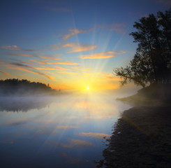 beautiful fog sunrise on river