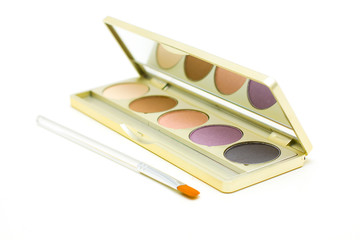 Cosmetics and make-up - eyeshadow with brush isolated