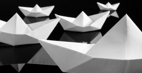 Many white paper boats