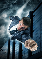 Superhero businessman flying over downtown