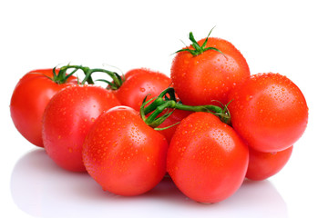 Ripe red tomatoes isolated on white