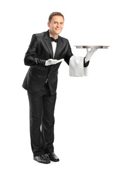 Butler holding an empty tray