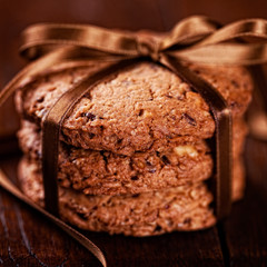 Homemade cookies with nuts tied with satin ribbon
