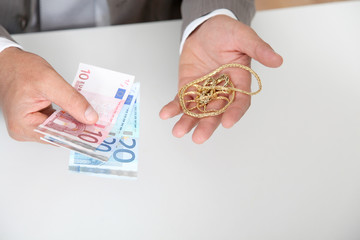 Gold against cash money