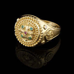 Gold ring with gems
