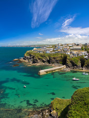 Cove and harbour of Port Isaac with blue skies, Cornwall