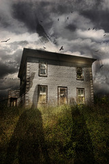 Old ababdoned house with flying ghosts