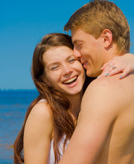 Obraz premium Holiday Kissing Couple