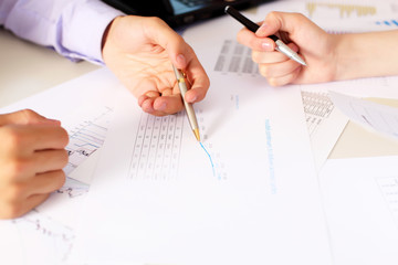 financial and business documents on the table