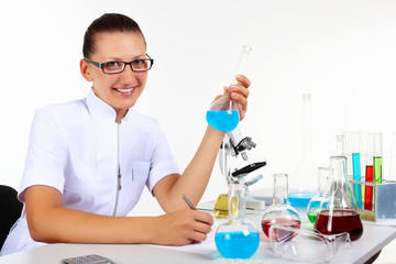 Fototapeta premium Female scientist in a chemistry laboratory