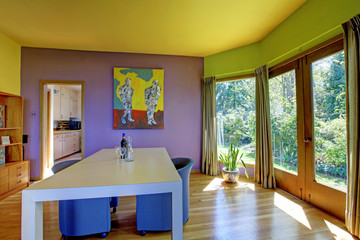Purple, green and yellow bright dining room