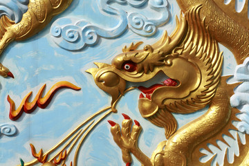 Gold Dragon Painting on the wall of Thai temple