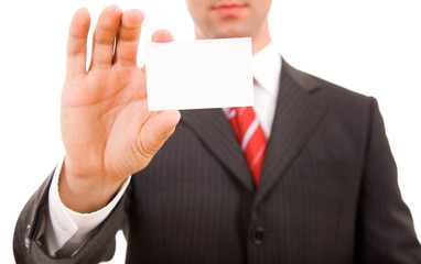Close-up of business card in business man hand