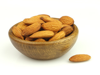 Wooden plate with almonds