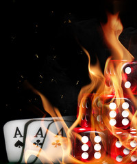 Dices with three aces in fire