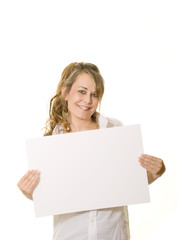 Fototapeta premium Woman holding white board with copy space