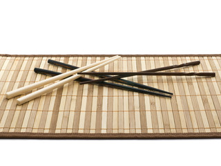 hashi chopsticks on bamboo napkin