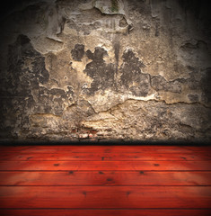 Grunge wall with wooden plank floor