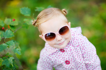 Cute girl in autumn park