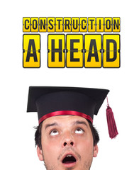 Young person looking at idea type of sign