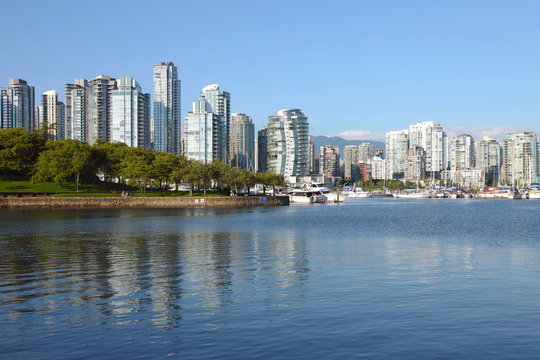 Vancouver BC south waterfront skyline & sailboats.