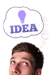 Young person looking at idea type of sign