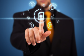 Businessman pressing virtual messaging type of icons