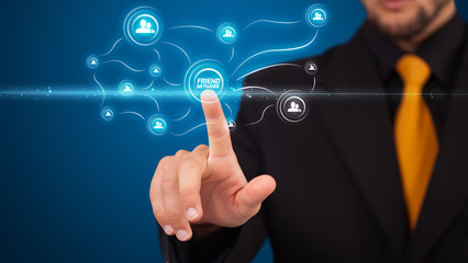 Businessman pressing modern social type of icons