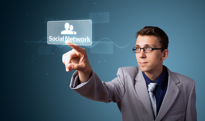 Businessman pressing modern social type of icons