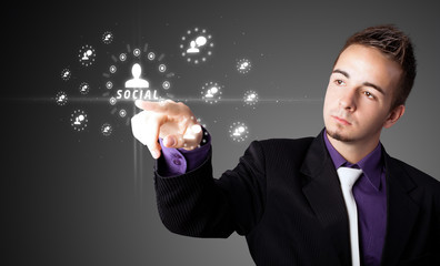 Businessman pressing modern social type of icons