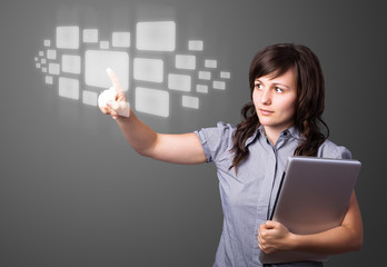 Businesswoman pressing high tech type of modern buttons