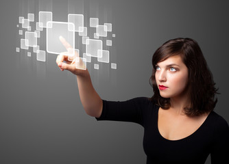 Businesswoman pressing high tech type of modern buttons