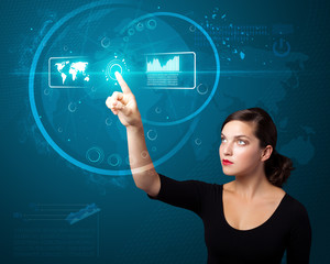 Businesswoman pressing high tech type of modern buttons