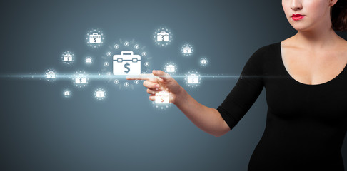 Businesswoman pressing modern business type of buttons