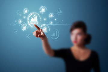 Businesswoman pressing modern business type of buttons