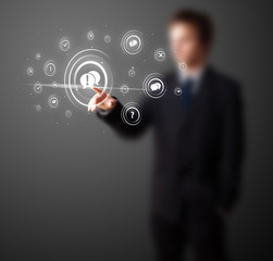 Businessman pressing modern social type of icons