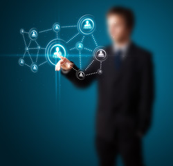 Businessman pressing modern social type of icons