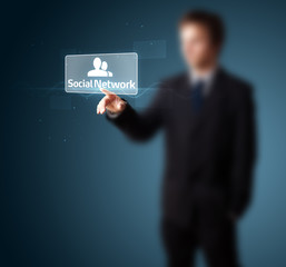 Businessman pressing modern social type of icons