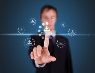 Businessman pressing high tech type of modern buttons