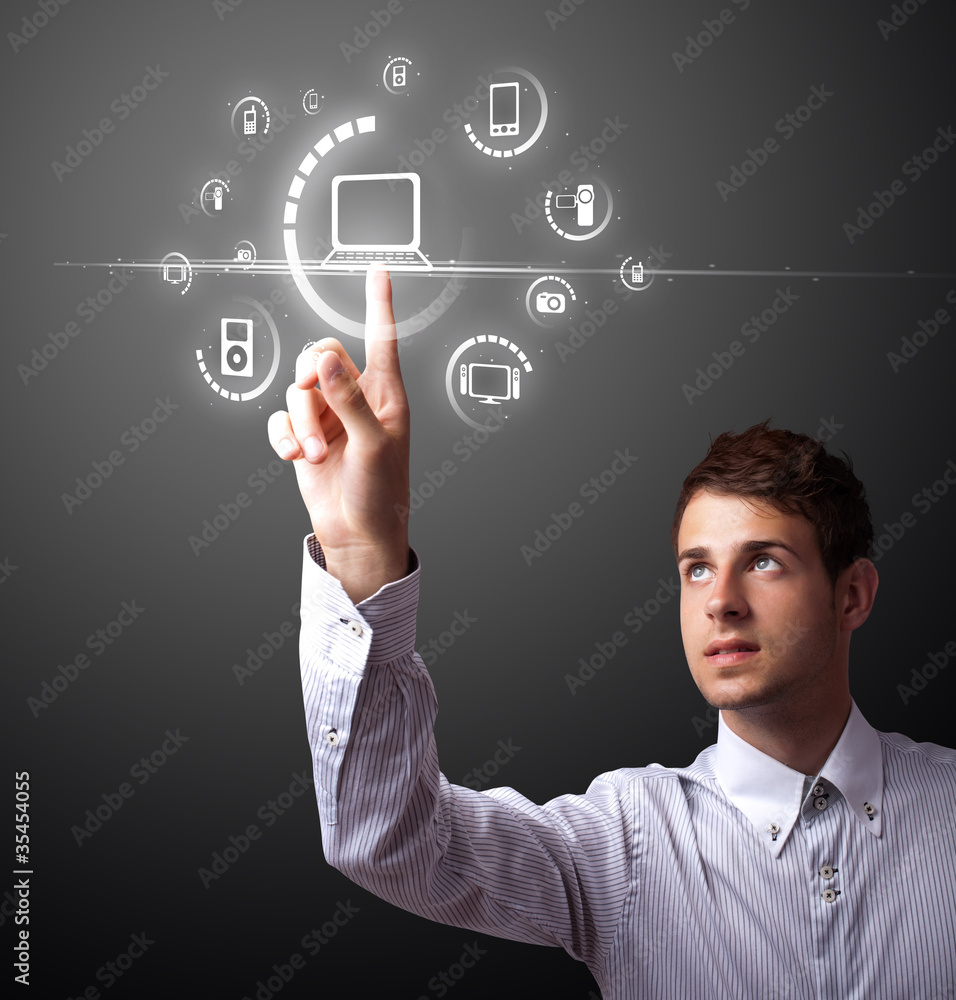 Wall mural Businessman pressing virtual media type of buttons