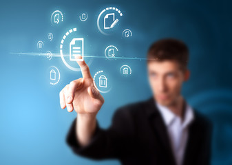 Businessman pressing virtual messaging type of icons