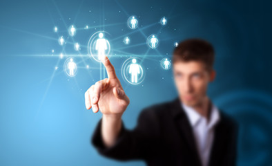 Businessman pressing modern social type of icons