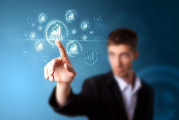 Businessman pressing modern business type of buttons