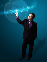 Businessman pressing modern social type of icons