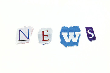The word NEWS using a mix of  torn paper.