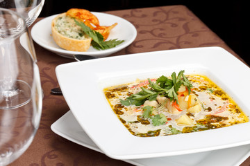 fish soup with potato chips and fish pie