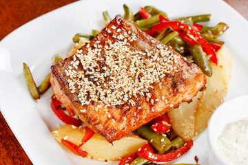 Fish steak with vegetables