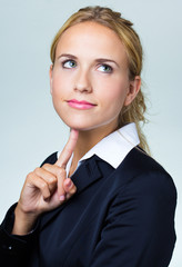 Closeup of a thinking blonde  businesswoman