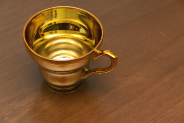 Golden cofee cup